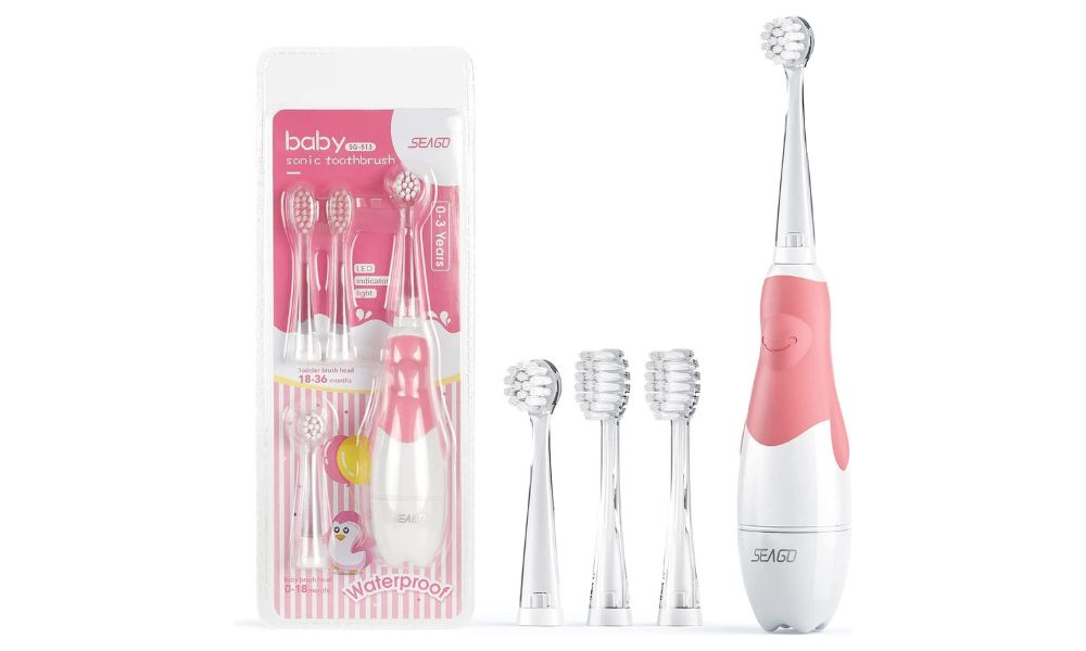 Cepillo de dientes infantil Seago baby de color blanco y rosa